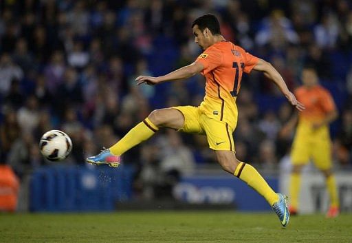 Barcelona's Pedro Rodriguez scores at the Cornella-El Prat stadium in Cornella de Llobregat on May 26, 2013